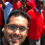 Rushi Panchal is pictured with students